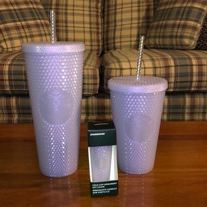 A set of three beautiful Starbucks cold cups.